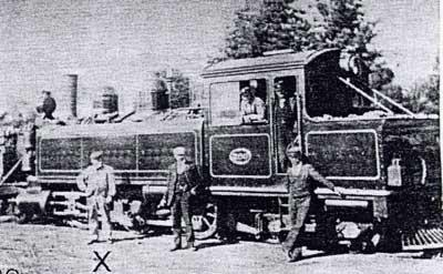 File0021-A.jpg - William(8) Gichard standing by the loco he devised the water system for
