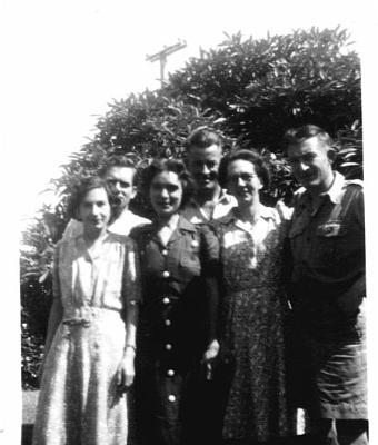 23-MILLER_Group.jpg - Back L to R Tom Venables James Leonard Stewart Front L
to R Jean Venables nee Miller, June Miller nee
Blomfield, Douglas Miller Christmas 1948 at 10 Totara
Street, Masterton