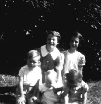 24-STEWART_Group.jpg - L to R Back Judith Stewart, Elisabeth Gael Pye nee
Stewart Front Graham Miller, Bruce Miller and Ann
Venables Christmas 1948 at 10 Totara Street, Masterton
