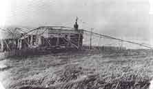 The transmitter building copped the lot. The antenna crashed down across the building roof.